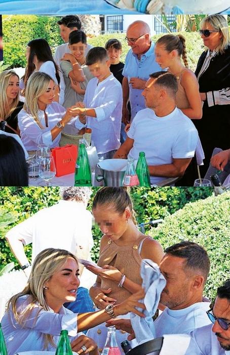 Alcuni momenti del pranzo per la comunione del figlio di Noemi Bocchi, le foto pubblicate da Chi totti bocchi 2-2