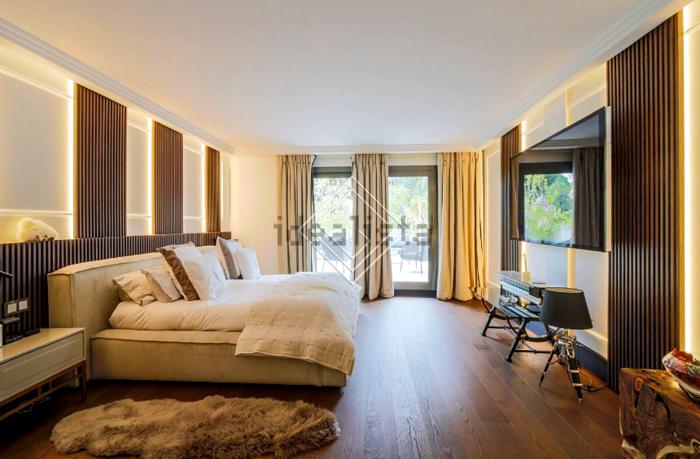 Una delle camere da letto, foto Idealista/GV | Real Estate casa mbappè-10